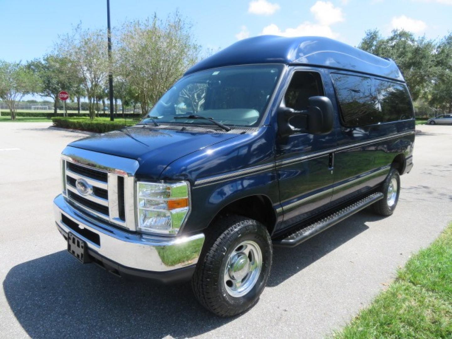 2011 Dark Blue /Gray Ford E-Series Wagon E-350 XLT Super Duty (1FBNE3BS4BD) with an 6.8L V10 SOHC 20V engine, located at 4301 Oak Circle #19, Boca Raton, FL, 33431, (954) 561-2499, 26.388861, -80.084038 - You are looking at a Gorgeous 2011 Ford Econoline E350 XLT Norcal Max High Top Handicap Wheelchair Conversion Van with 6.8L V10, 15K Original Miles, 9 Inch Lowered Floor, Braun UVL Side Entry Wheelchair Lift, Remote Control Power Side Entry Doors, Expanded Side Entry Doors, Q Straint Tie Down, Syste - Photo#21